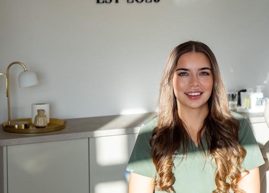 A friendly beauty specialist at Muse - Ballyclare, Northern Ireland, GB, showcasing the serene salon ambiance.