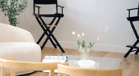 Cozy seating area with tulips at Sand + Sol Studio, Rogers, Arkansas, US.