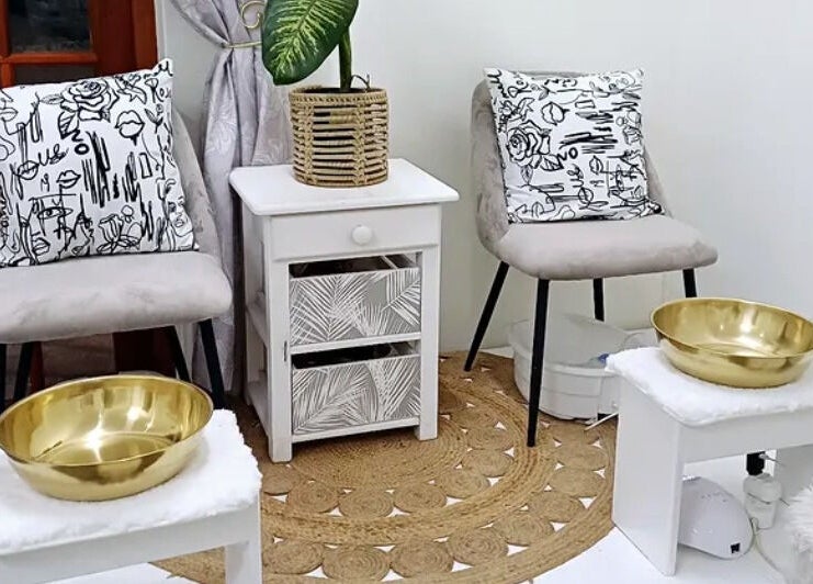 Chic pedicure setup at Salon Beautè in Hillcrest, Kwazulu-natal, ZA with gold bowls and stylish decor.