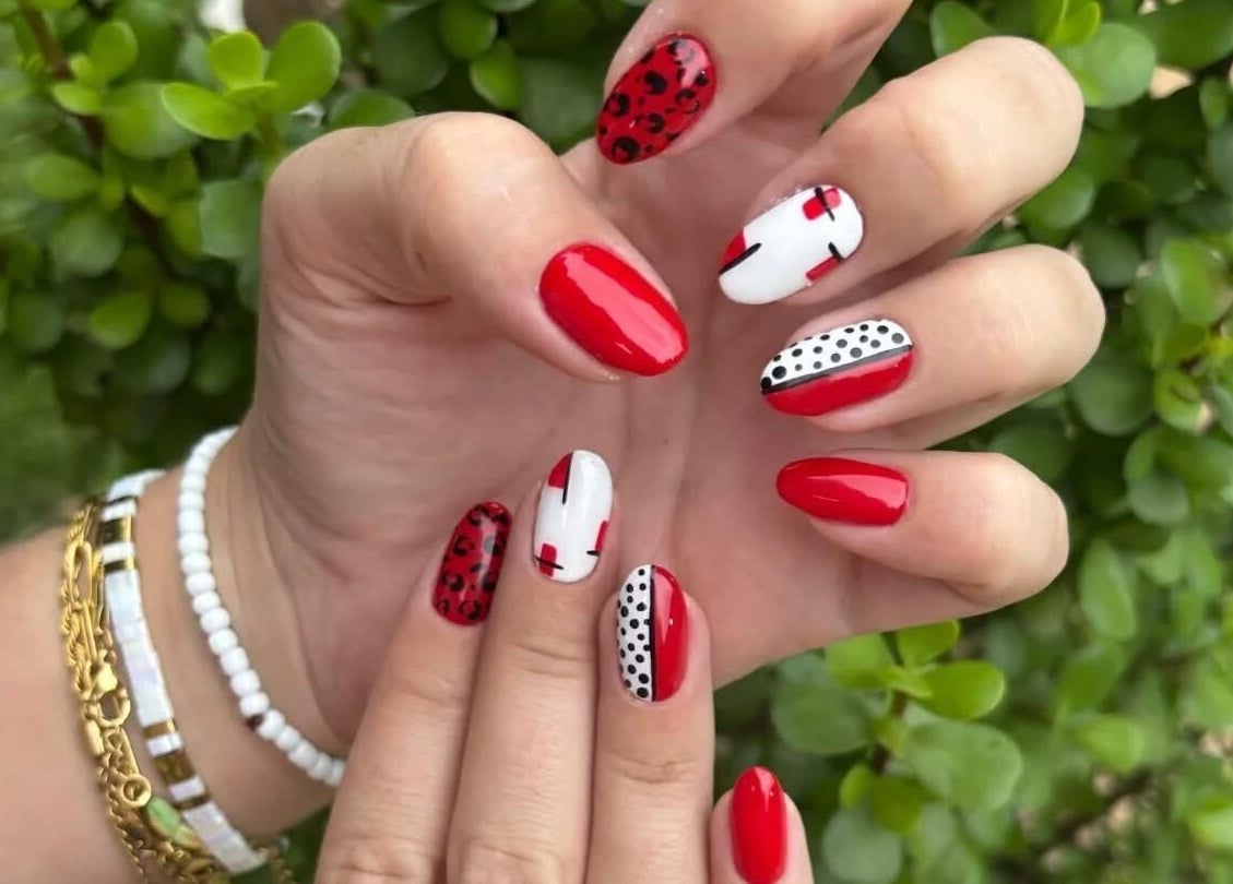 Creative red and white nail art design at Salon Beautè, Hillcrest, Kwazulu-natal, ZA.