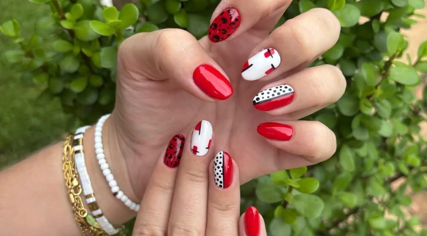 Creative red and white nail art design at Salon Beautè, Hillcrest, Kwazulu-natal, ZA.
