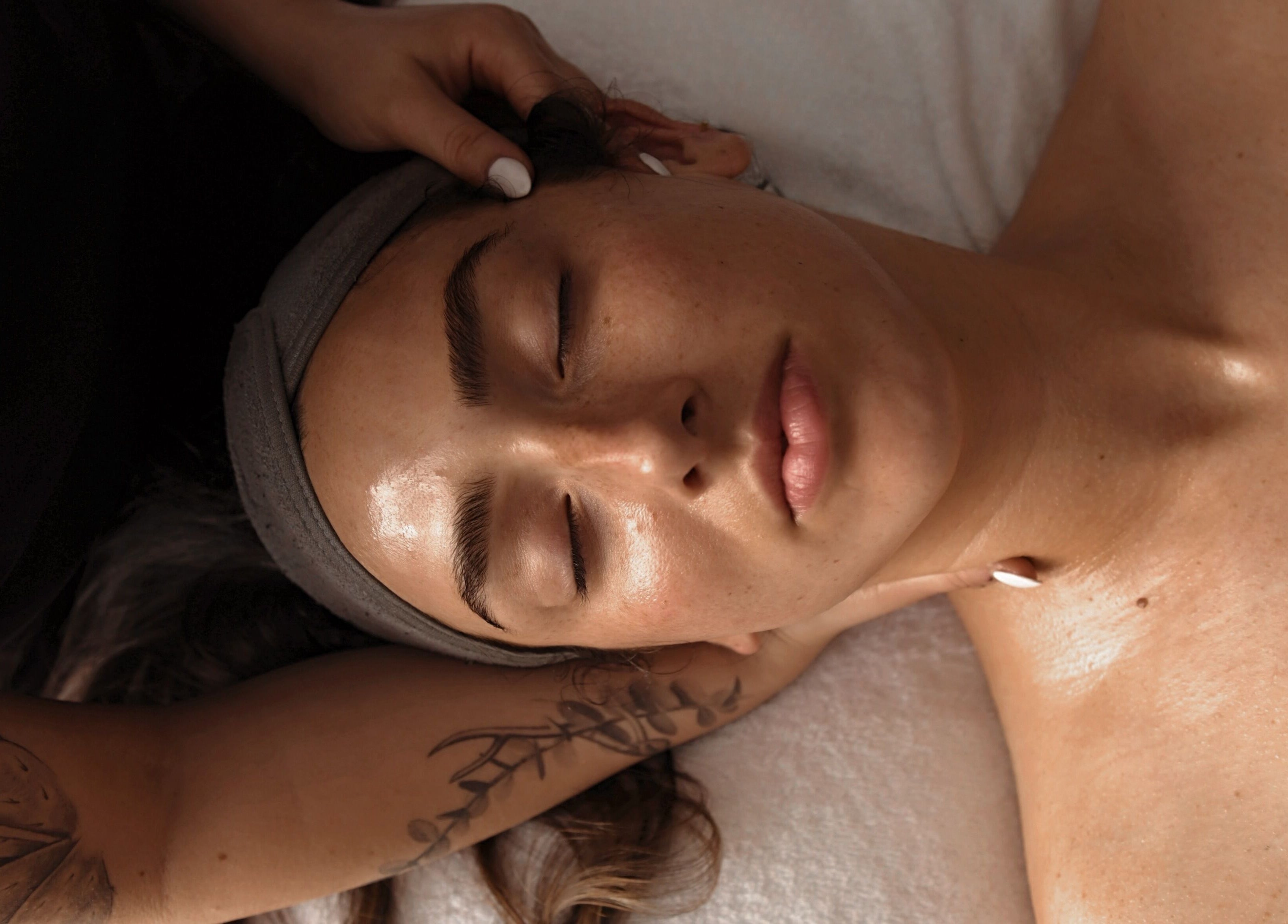 Facial massage at Enhance Esthetics in Baltimore, Maryland, US, promoting relaxation and skincare rejuvenation.