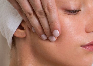 Close-up of a relaxing face massage at Elevate, Glasgow, Scotland, GB, emphasizing skin rejuvenation.