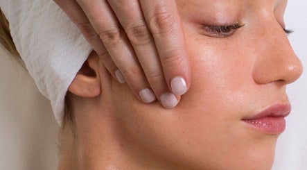 Close-up of a relaxing face massage at Elevate, Glasgow, Scotland, GB, emphasizing skin rejuvenation.