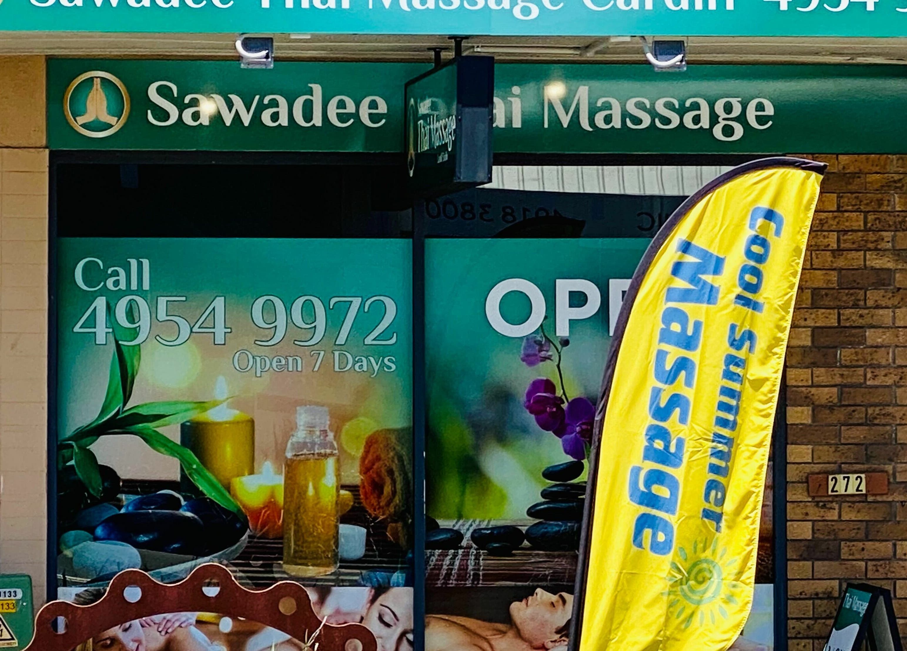 Entrance of Sawadee Cardiff Thai Massage in Cardiff, New South Wales, AU with vibrant signage and banners.