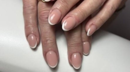 Beautiful French manicure at The Beauty Box, North Sunderland, England, GB, showcasing elegant nail art.
