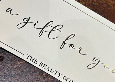 Gift card from The Beauty Box in North Sunderland, England, GB, featuring elegant cursive text.