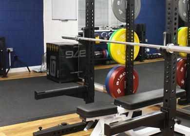 Well-equipped gym with weightlifting rack at Exe Fitness, Exmouth, England, GB.