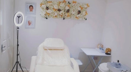Calm beauty treatment room at 36 The Tything, Worcester WR1 1JL, Worcester, England, GB featuring a floral decor.