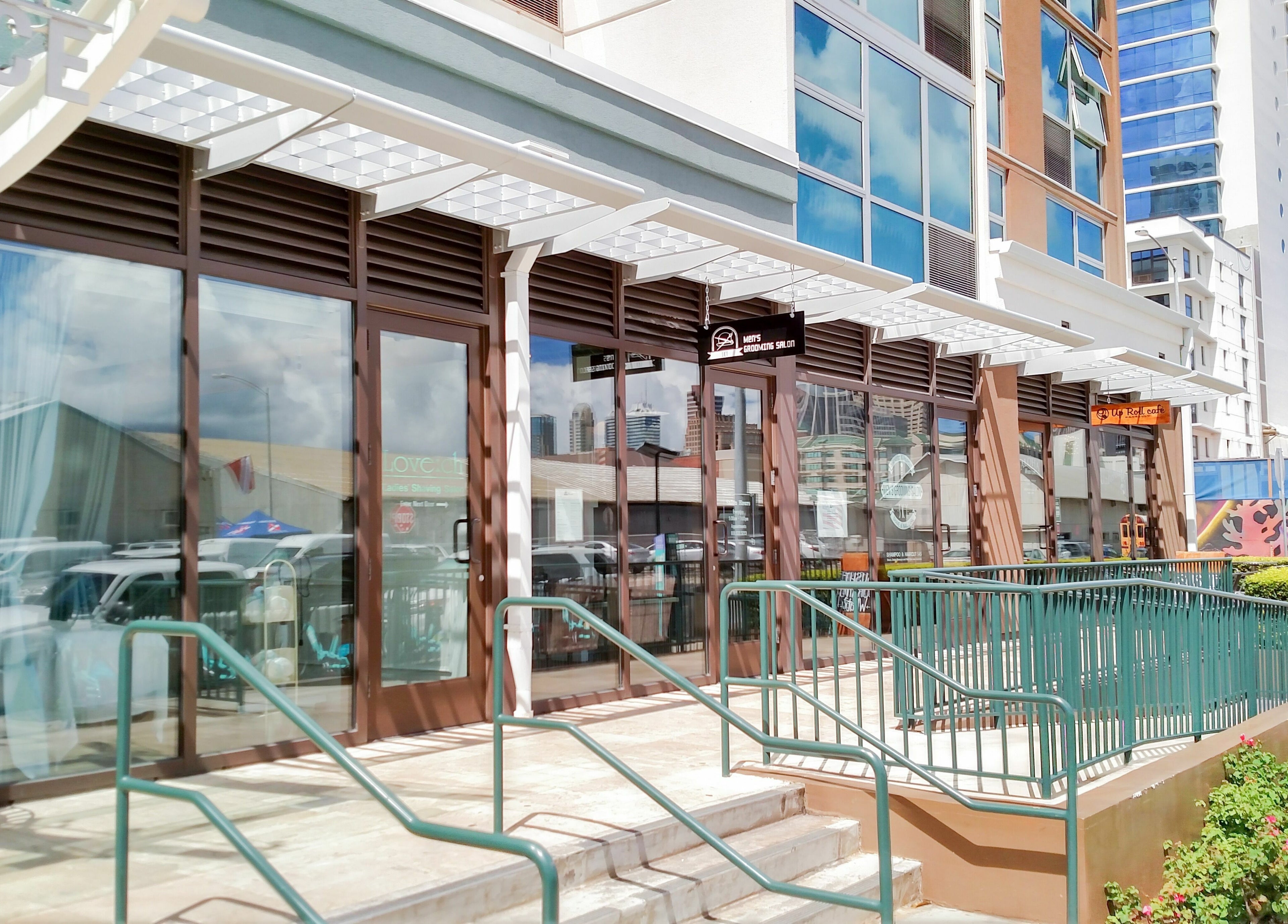 Entrance of Men's Grooming Salon SKY in Honolulu, Hawaii, US, showcasing modern design and accessibility.