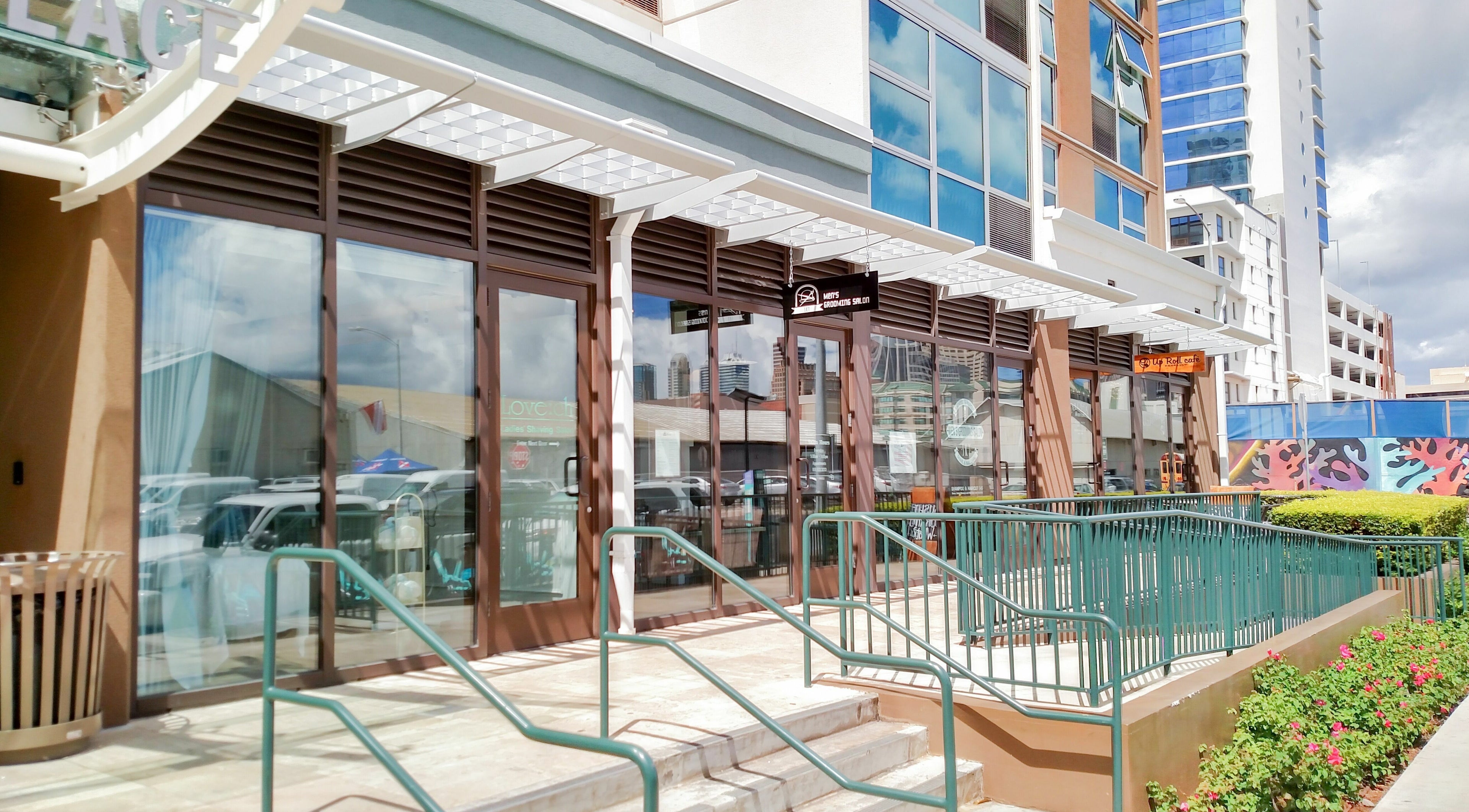 Entrance of Men's Grooming Salon SKY in Honolulu, Hawaii, US, showcasing modern design and accessibility.