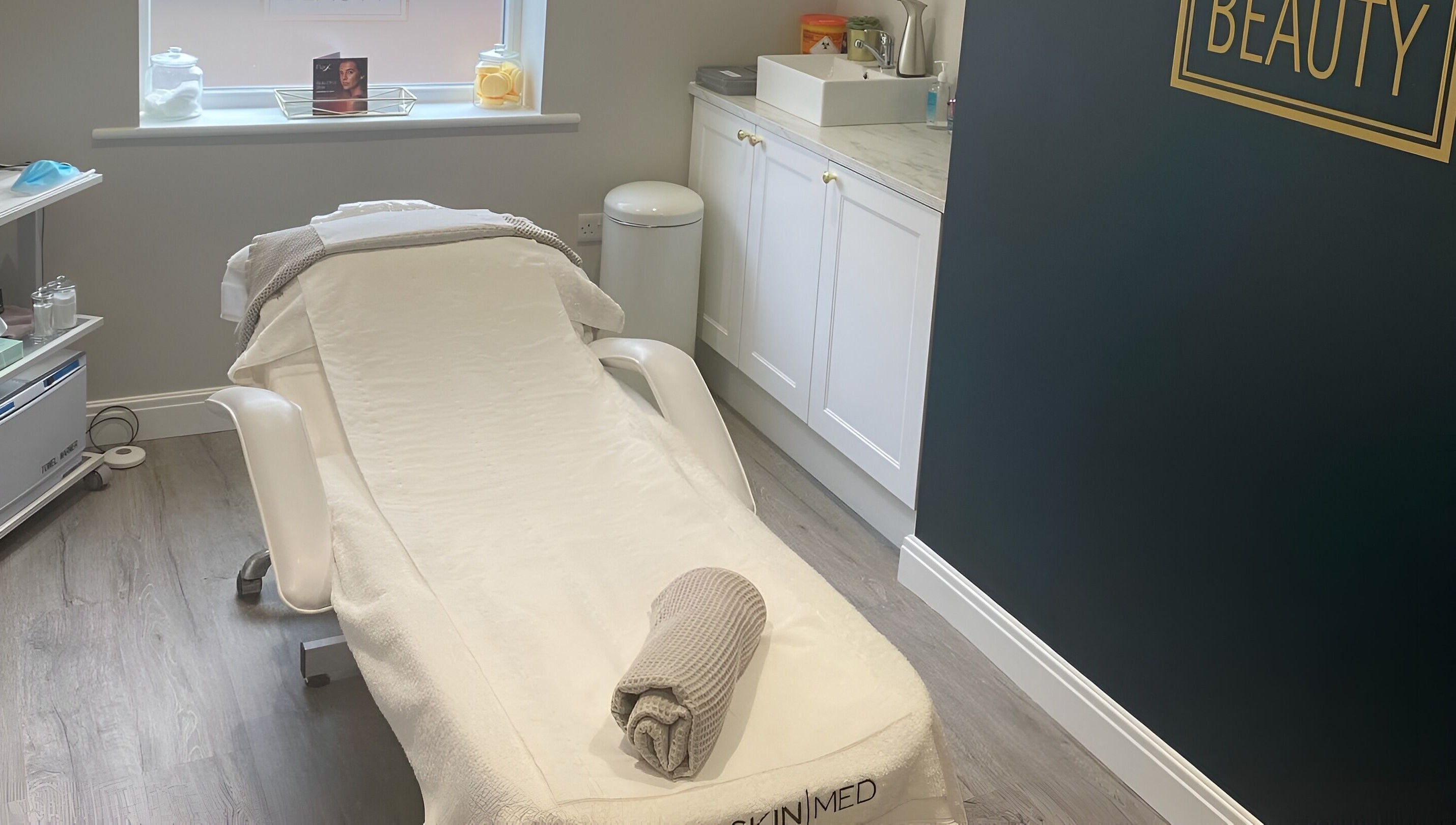 Relaxing spa room at No 5 Beauty, Wetherby, England, GB, featuring a comfortable treatment bed.