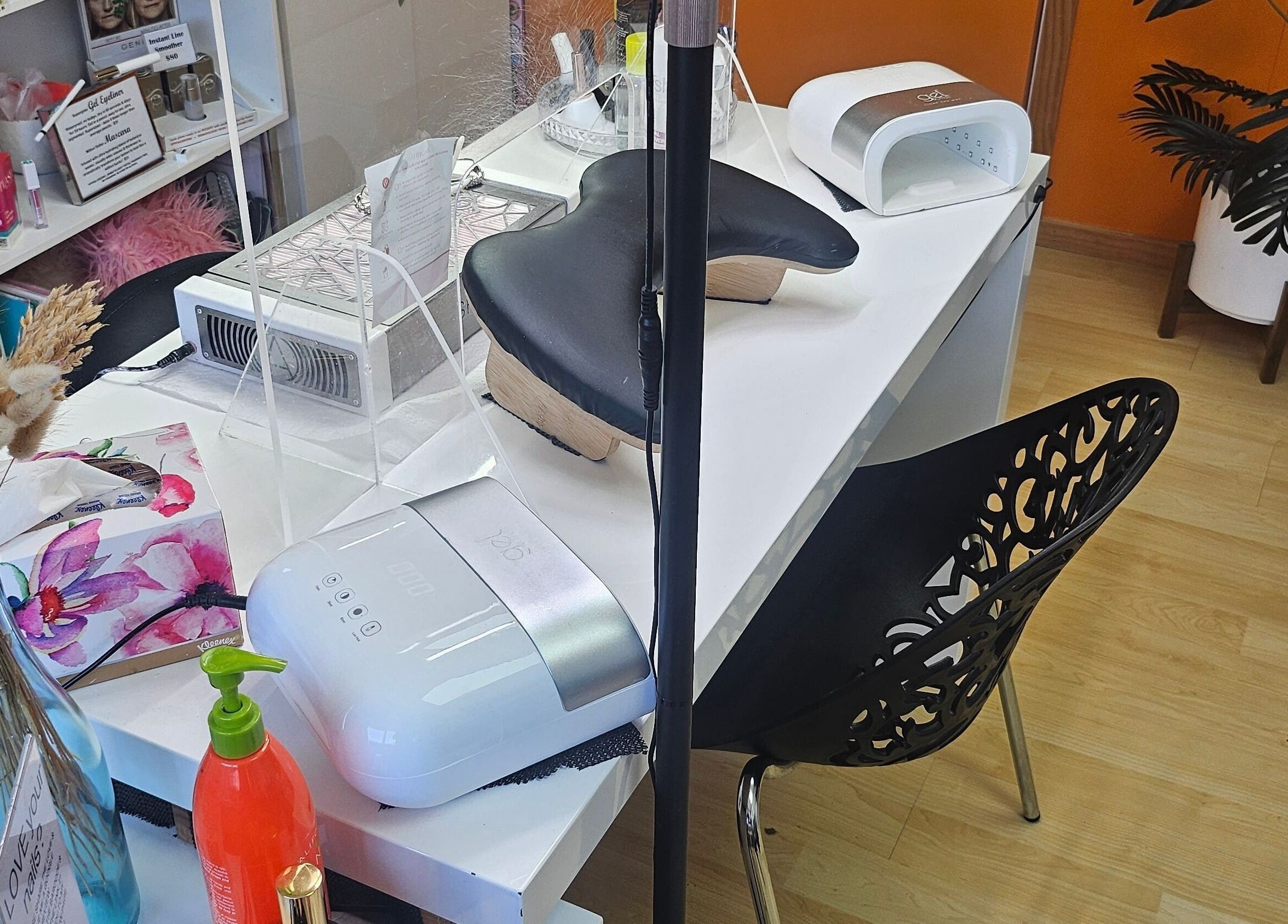 The Polish Room's chic nail station in Taupō, Waikato, NZ, features modern equipment and stylish decor.