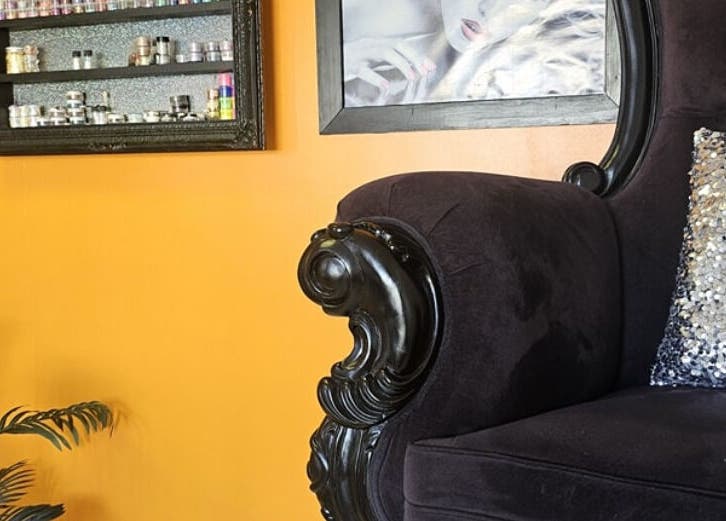 Elegant chair and sequin pillow in The Polish Room, Taupō, Waikato, NZ.
