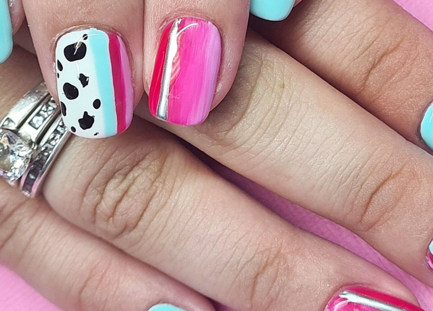 Stylish nail art with colorful patterns at The Polish Room, Taupō, Waikato, NZ.