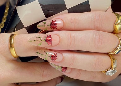Elegant rose nail art at Ally B Nails, Aylesbury, England, GB. Perfectly manicured style for fashion-forward clients.