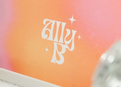 Ally B Nails logo on vibrant pink and orange background in Aylesbury, England, GB.