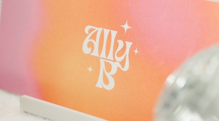 Ally B Nails logo on vibrant pink and orange background in Aylesbury, England, GB.