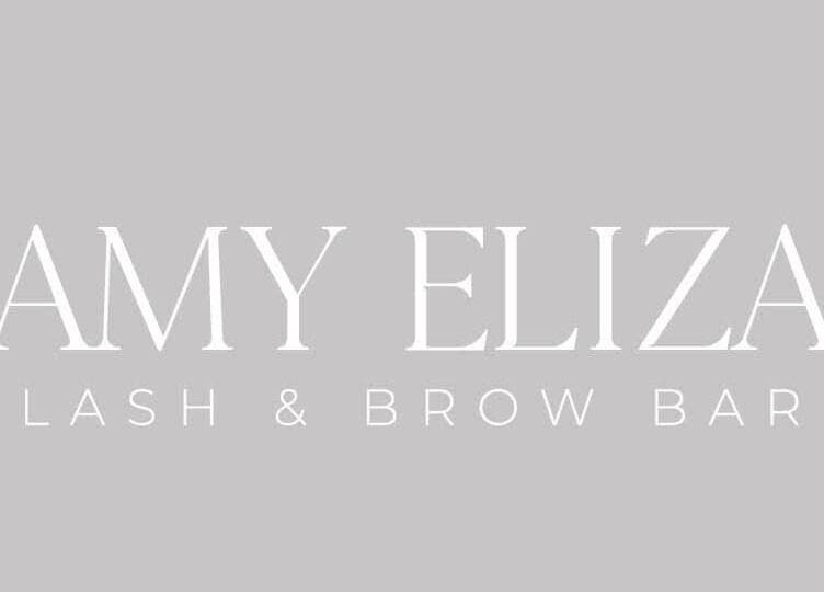 Logo of Amy Eliza Lash & Brow Bar, Truro, England, GB in elegant font with gray background.