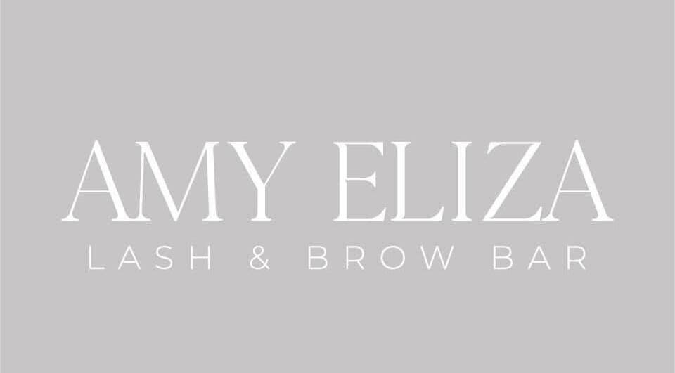 Logo of Amy Eliza Lash & Brow Bar, Truro, England, GB in elegant font with gray background.