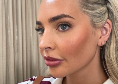 Close-up of a woman with flawless makeup at Emily Marietta Barker, Glasgow, Scotland, GB.
