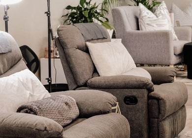 Cozy chairs in Base Coat Melkbos spa lounge, Cape Town, Western Cape, ZA, perfect for relaxation sessions.
