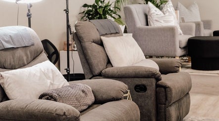 Cozy chairs in Base Coat Melkbos spa lounge, Cape Town, Western Cape, ZA, perfect for relaxation sessions.