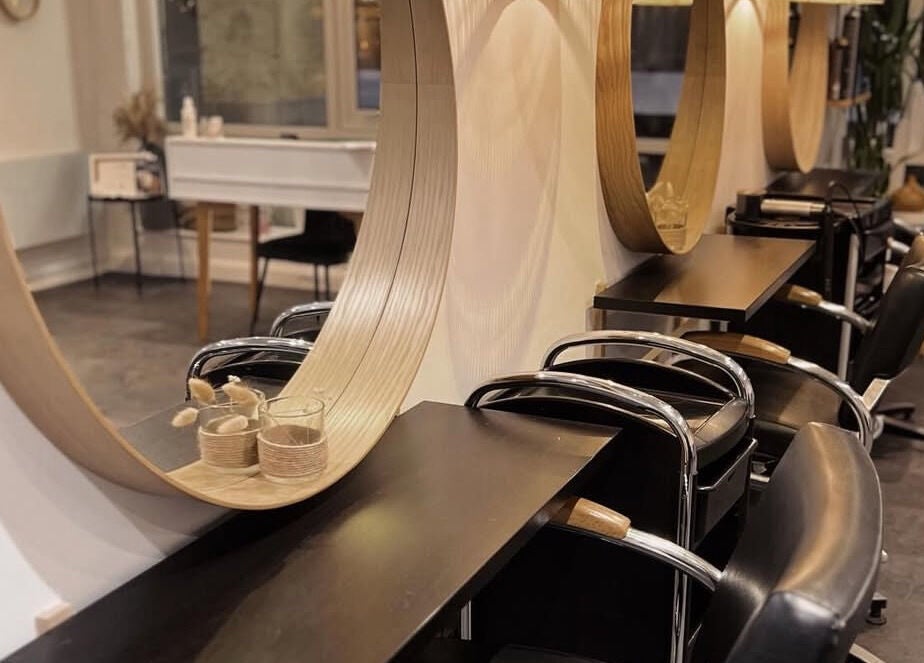 Luxurious salon chairs and mirrors at Fika Hair - Caton Road in Lancaster, England, GB.