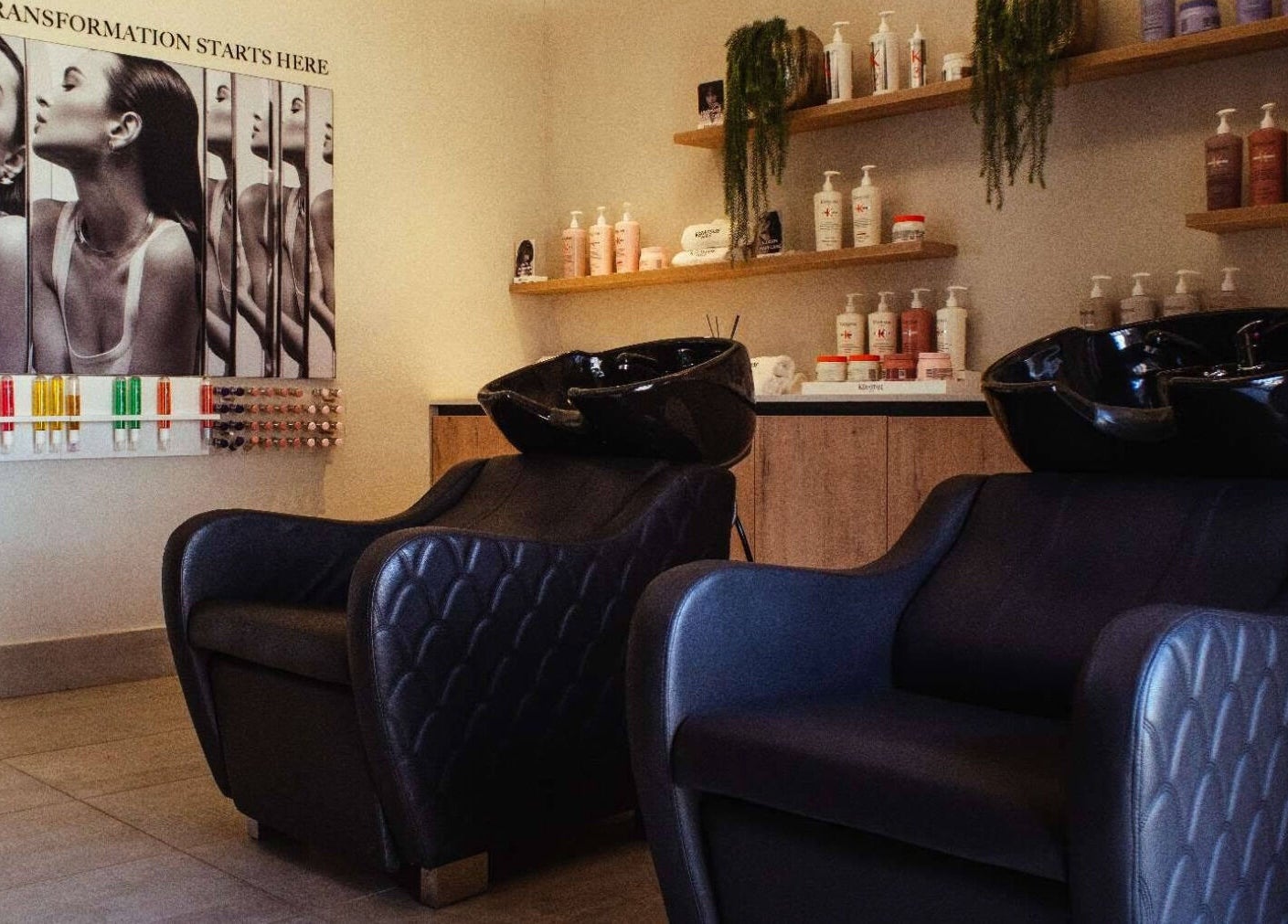 Luxurious hair salon interior at The Glow, featuring chic chairs and beauty products in Benoni, Gauteng, ZA.