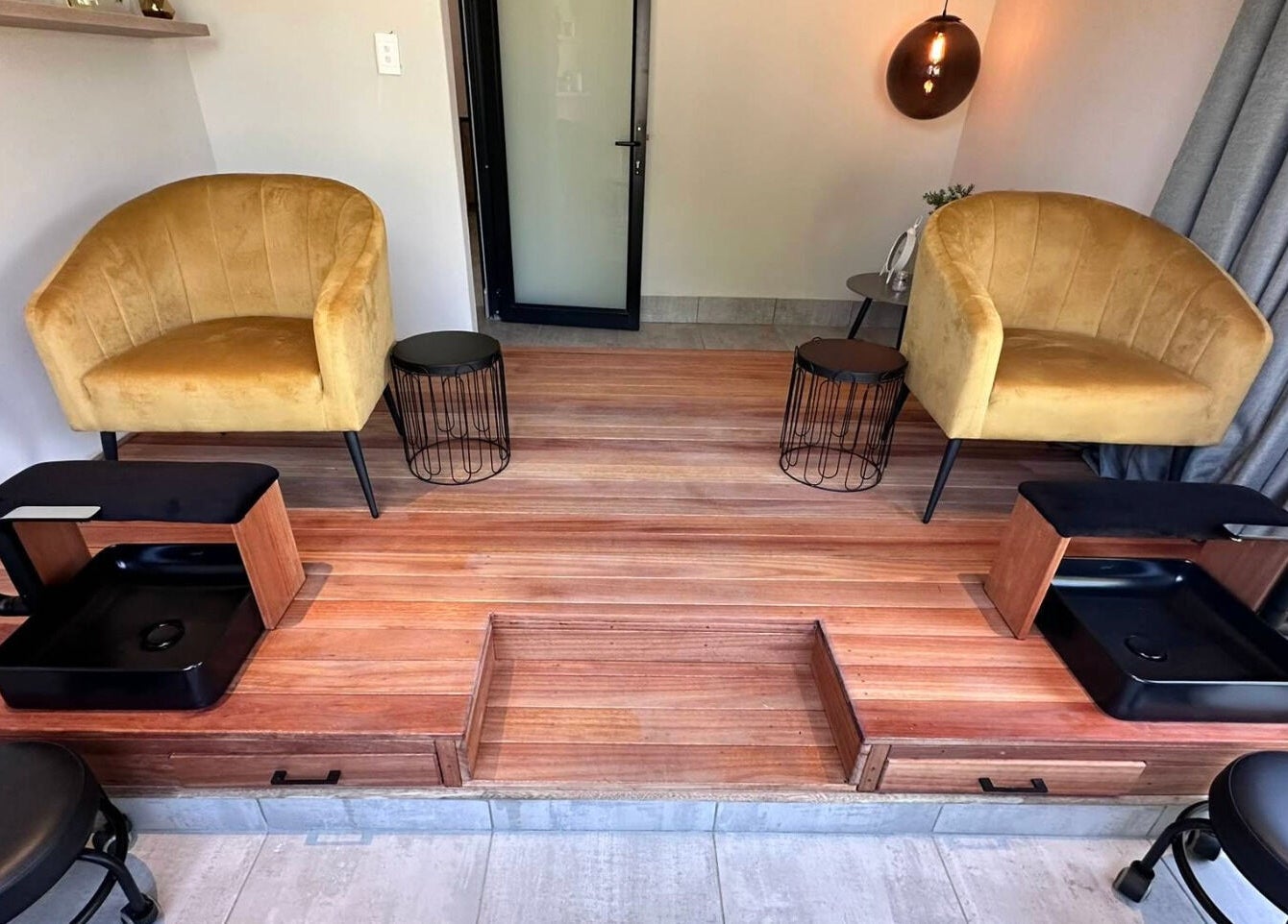 Stylish pedicure chairs at The Glow, Benoni, Gauteng, ZA offer a luxurious beauty experience.