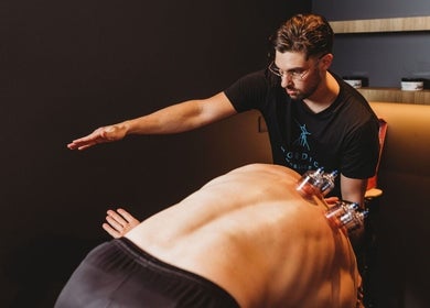 Therapist performing cupping therapy at Nordic Massage Campbell, Campbell, Australian Capital Territory, AU.