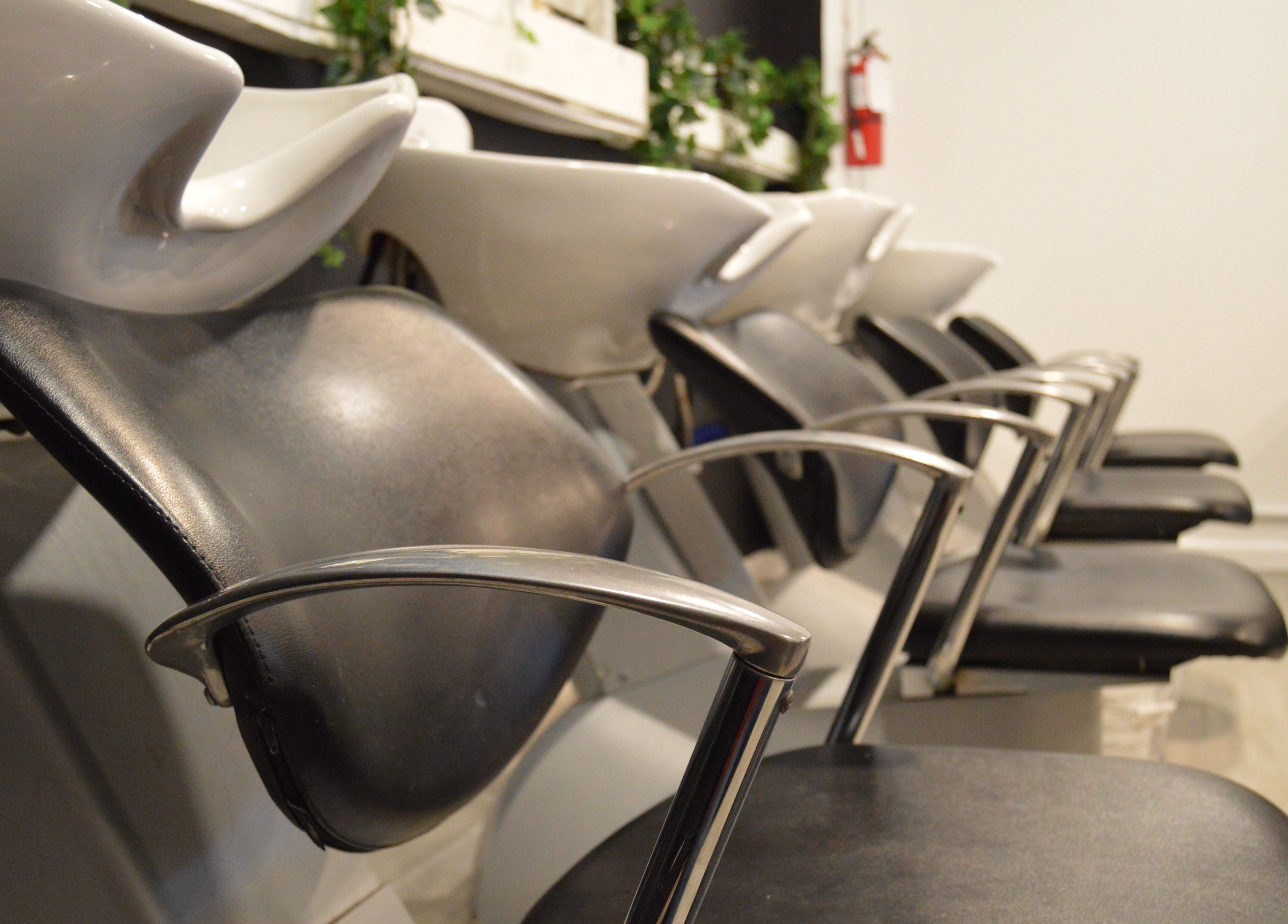 Modern wash stations at Alexa’s Dominican Salon in Woodbridge Township, New Jersey, US.