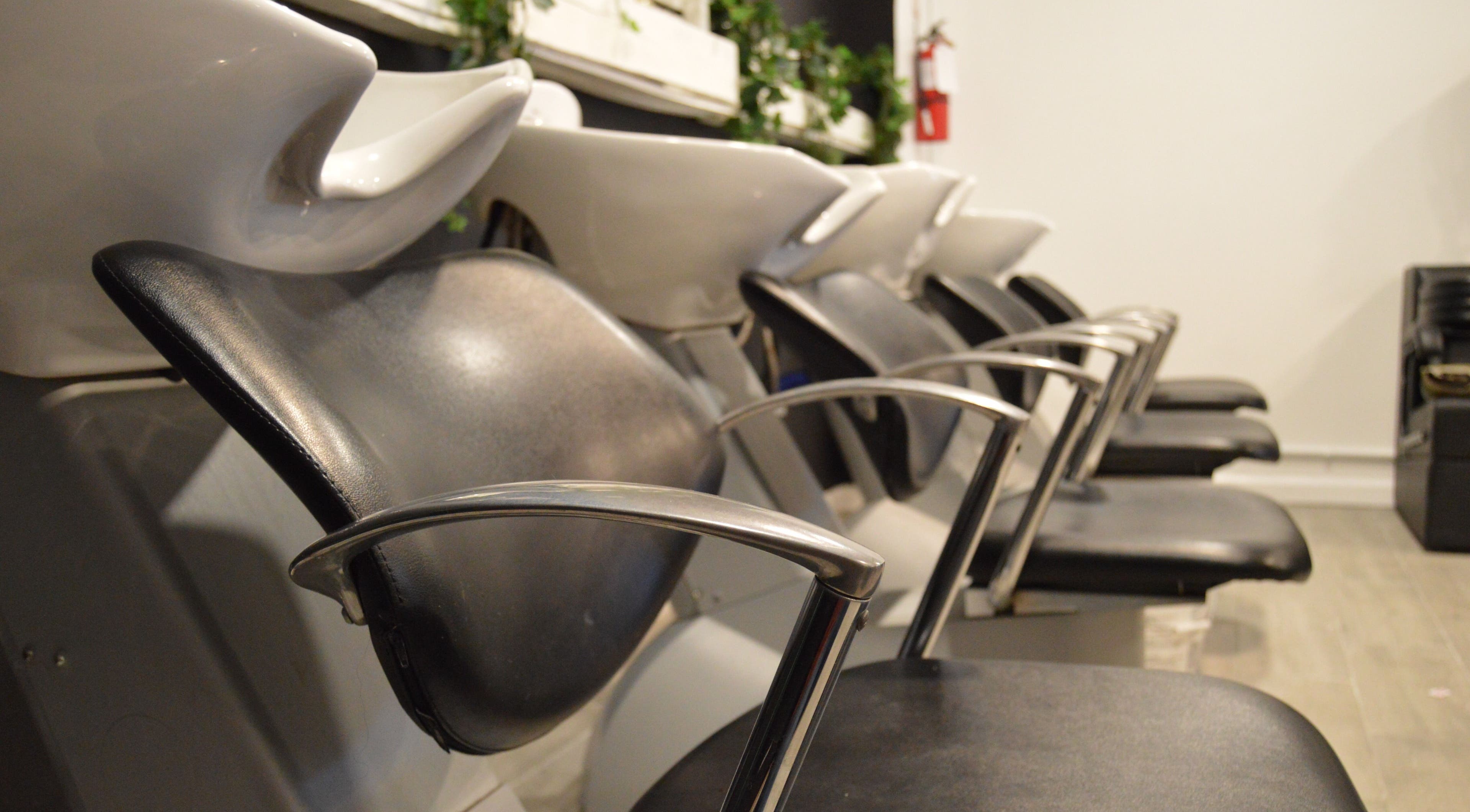 Modern wash stations at Alexa’s Dominican Salon in Woodbridge Township, New Jersey, US.