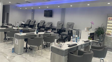 Davie Nails salon interior with modern manicure stations, Davie, Florida, US.