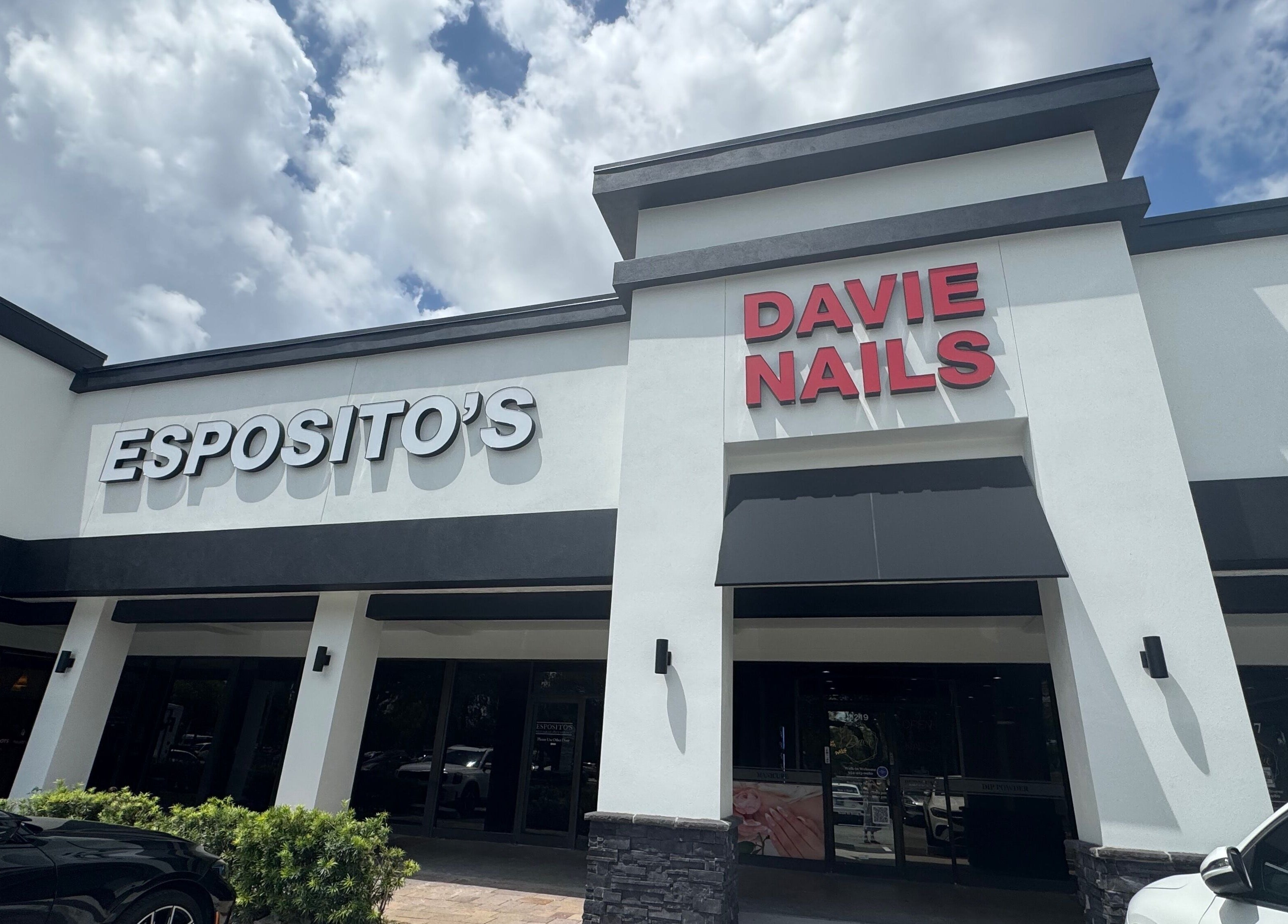Exterior view of Davie Nails, Davie, Florida, US, showcasing its stylish facade.