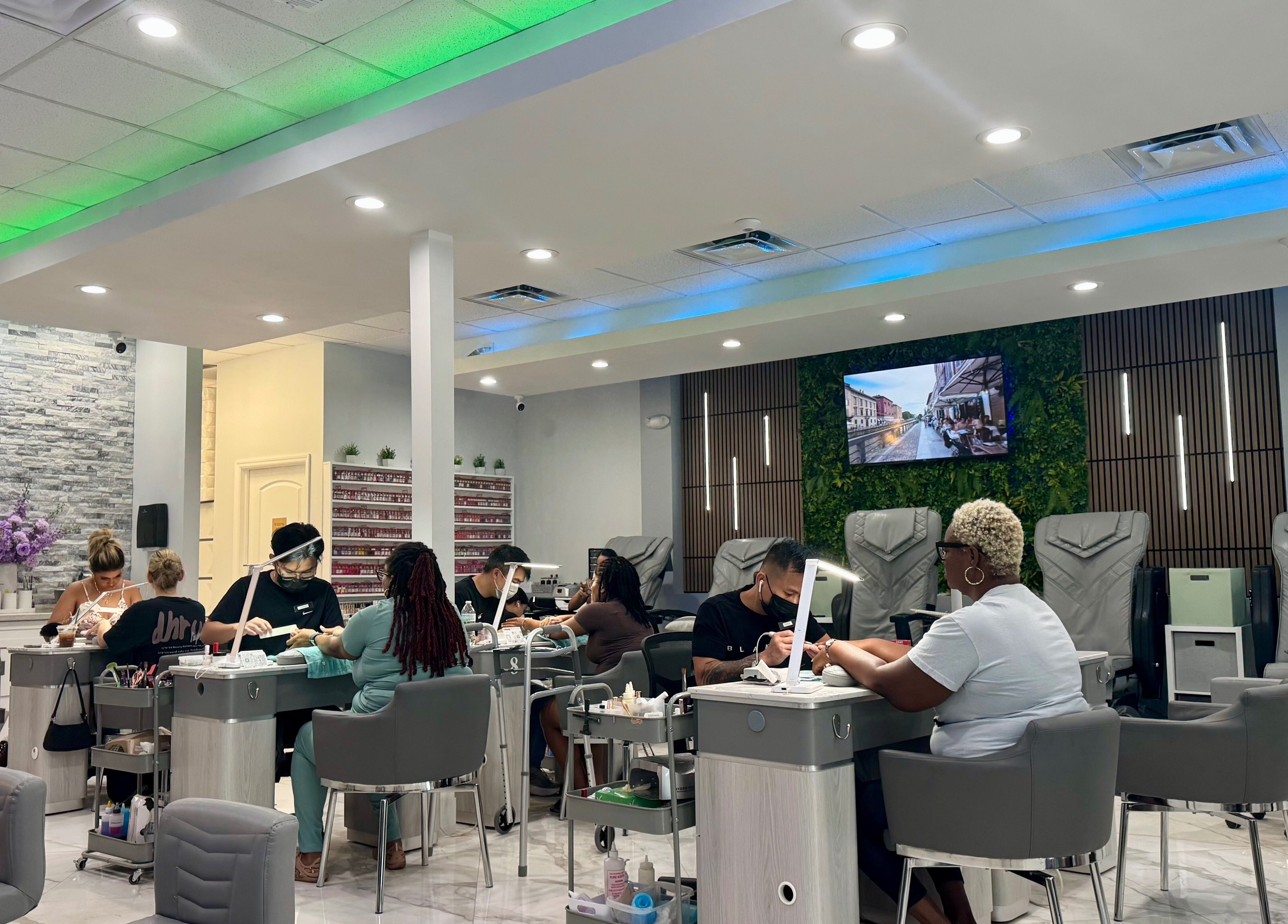 Inside Davie Nails, sleek chairs and modern decor create a serene ambiance. Davie, Florida, US nail salon.