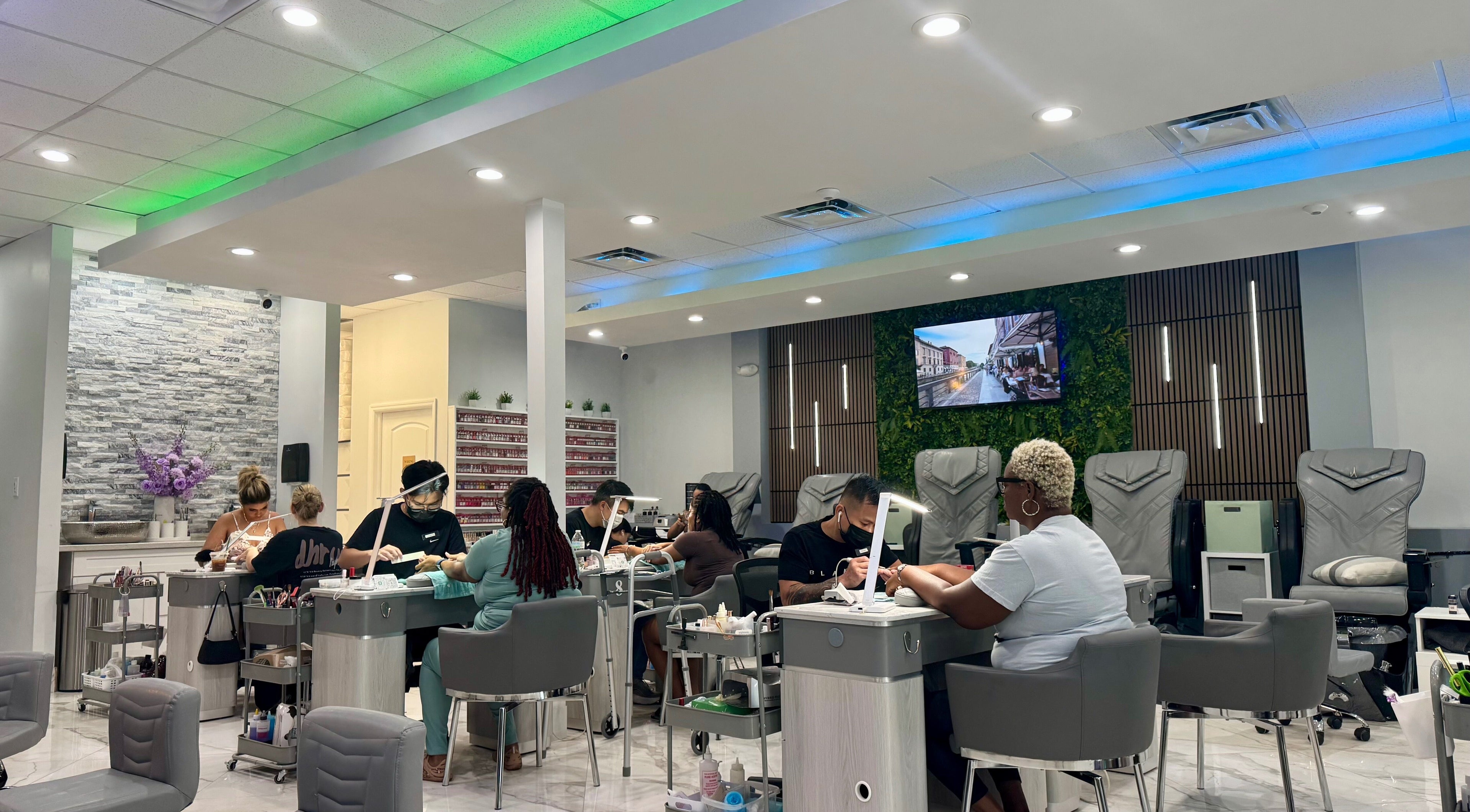 Inside Davie Nails, sleek chairs and modern decor create a serene ambiance. Davie, Florida, US nail salon.