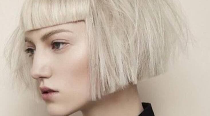 Woman with chic platinum bob hairstyle at Dom Republic in Johannesburg, Gauteng, ZA.