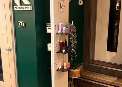 Product shelves at Pearce and Chapman Hair and Beauty in Beddau, Wales, GB featuring Kevin Murphy products.