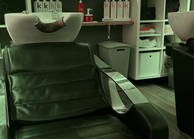 Luxurious salon chair at Pearce and Chapman Hair and Beauty in Beddau, Wales, GB, ideal for hair treatments.