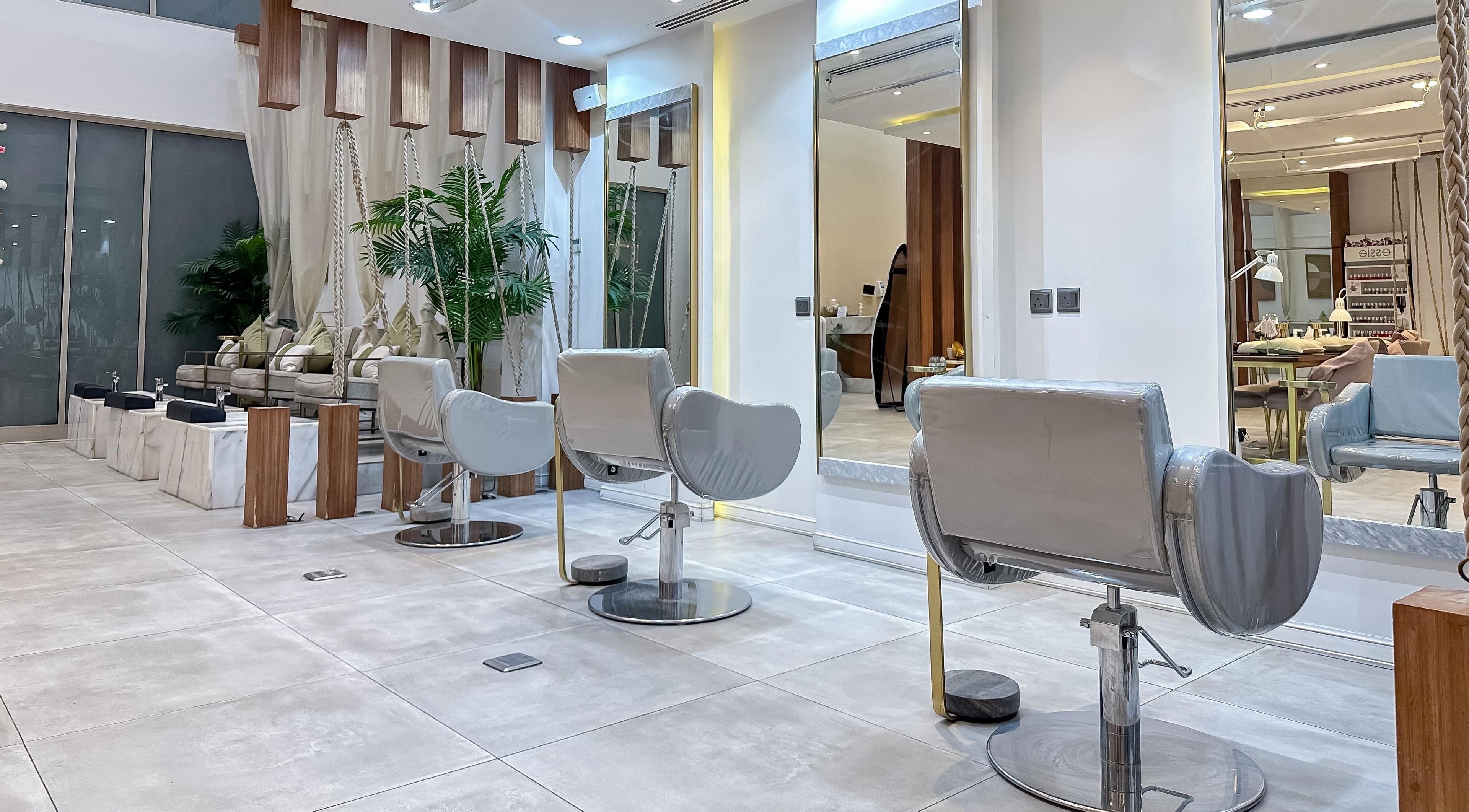Modern salon seating area at Glow Beauty Salon in Al Qatif, Eastern Province, SA with elegant decor.