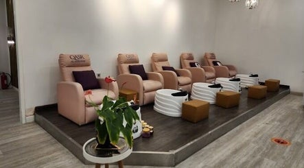 Relaxing pedicure chairs at Companion Beauty Salon Badia Branch in Dubai, AE, inviting comfort and style.