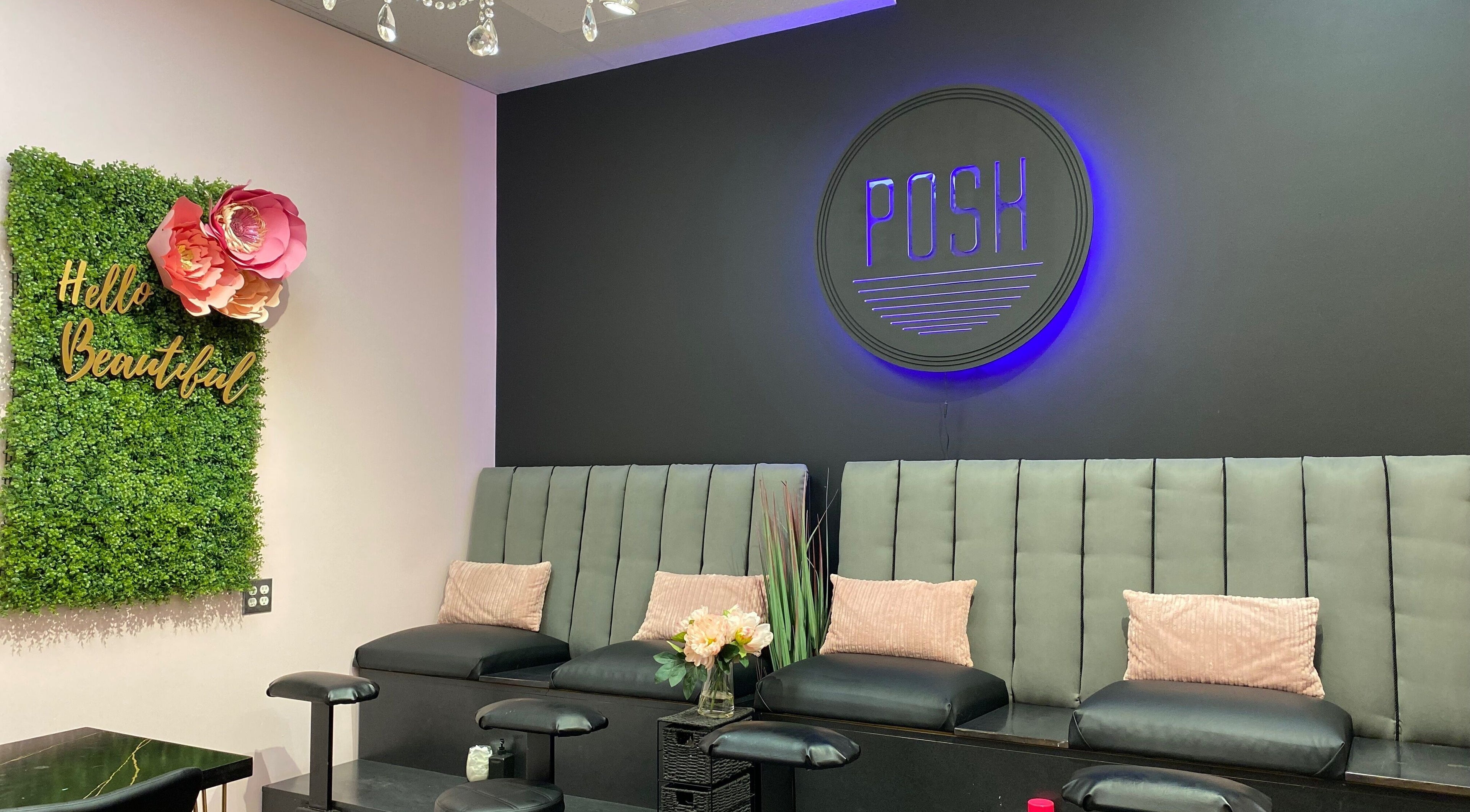 Chic seating area at Posh Pedicure Lounge in London, Ontario, CA with plush seating and decor.