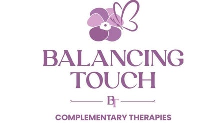 Logo of Balancing Touch Complementary Therapies featuring a purple flower and butterfly, located in Risca, Wales, GB.