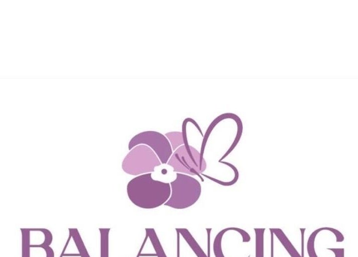 Balancing Touch Complementary Therapies logo with purple floral design in Risca, Wales, GB.