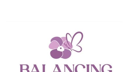 Balancing Touch Complementary Therapies logo with purple floral design in Risca, Wales, GB.