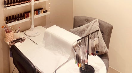 Nail salon setup at Hester Mind, Body and Soul, Weston-super-mare, England, GB, featuring polish and tools.