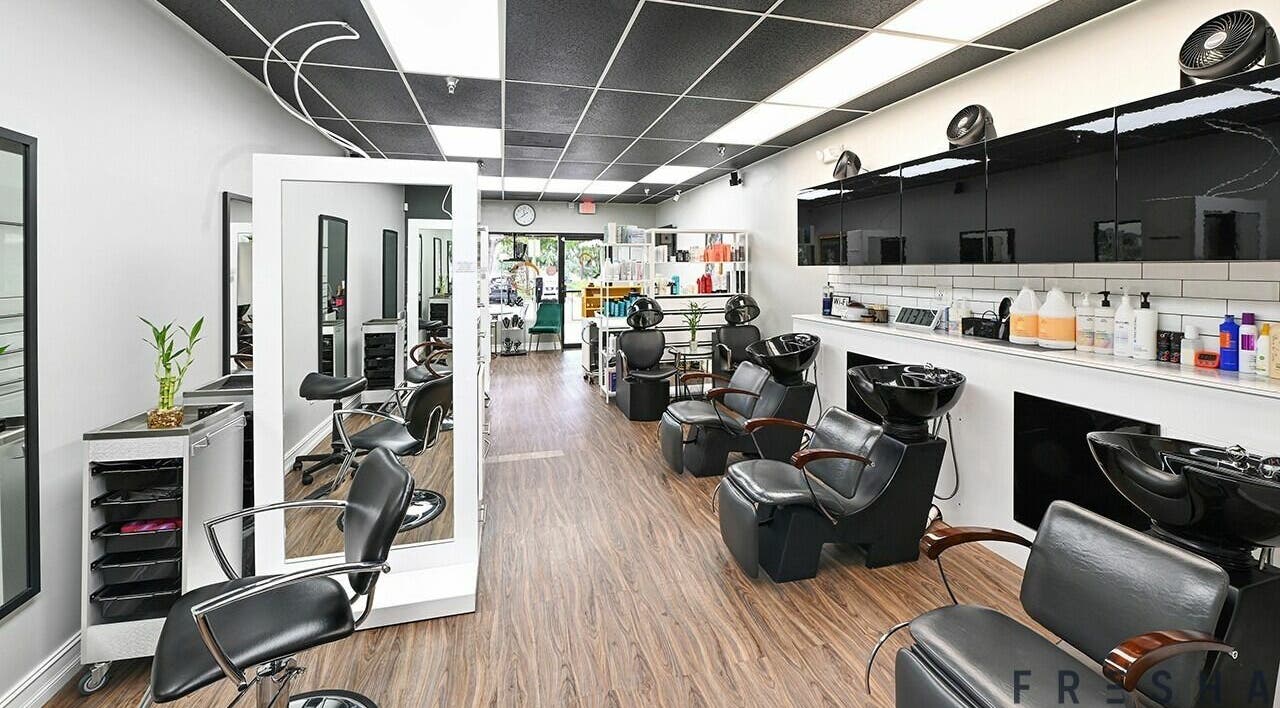 Modern salon chairs and mirrors at Hanna Jade Beauty Bar, Miami Lakes, Florida, US.