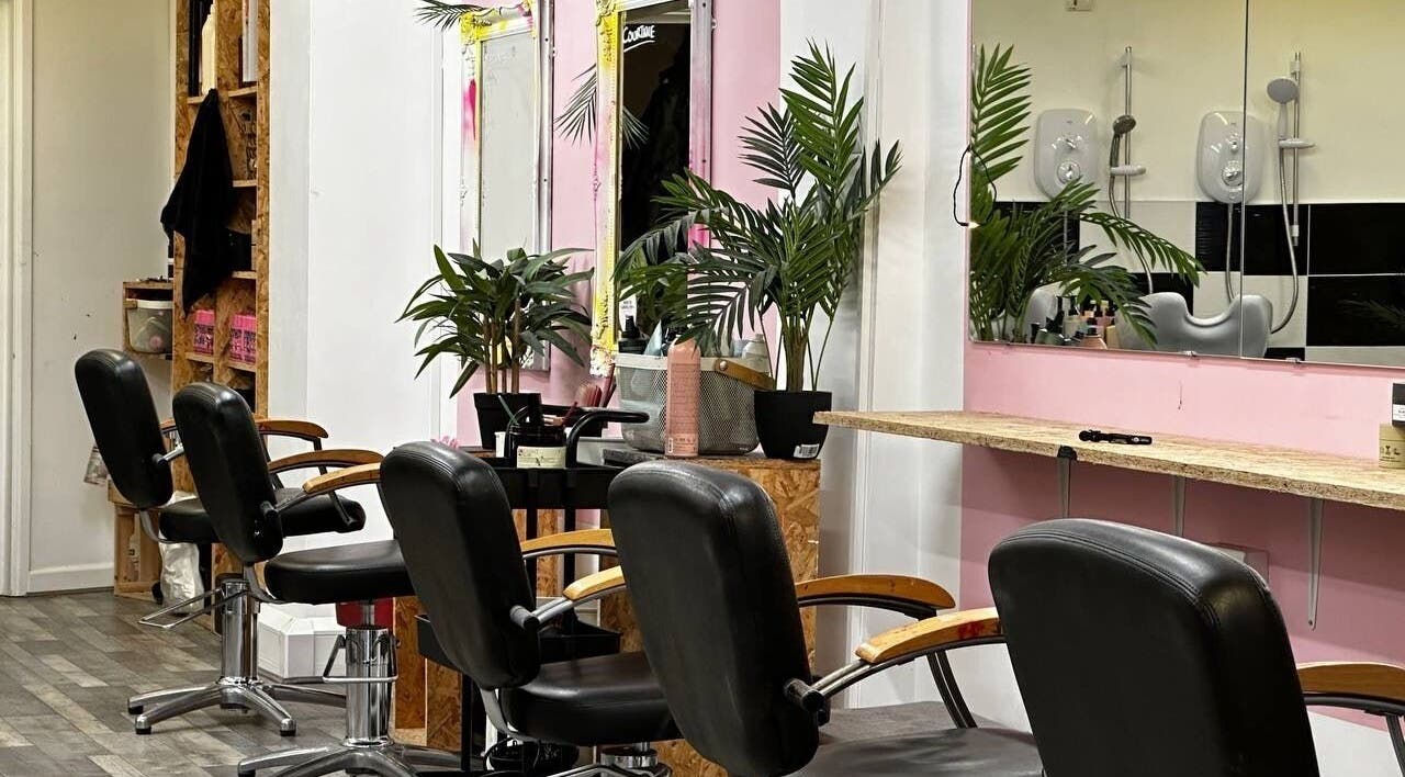 Elegant styling chairs at Pixal-Rose Hair Design, Swindon, England, GB, complement modern decor.