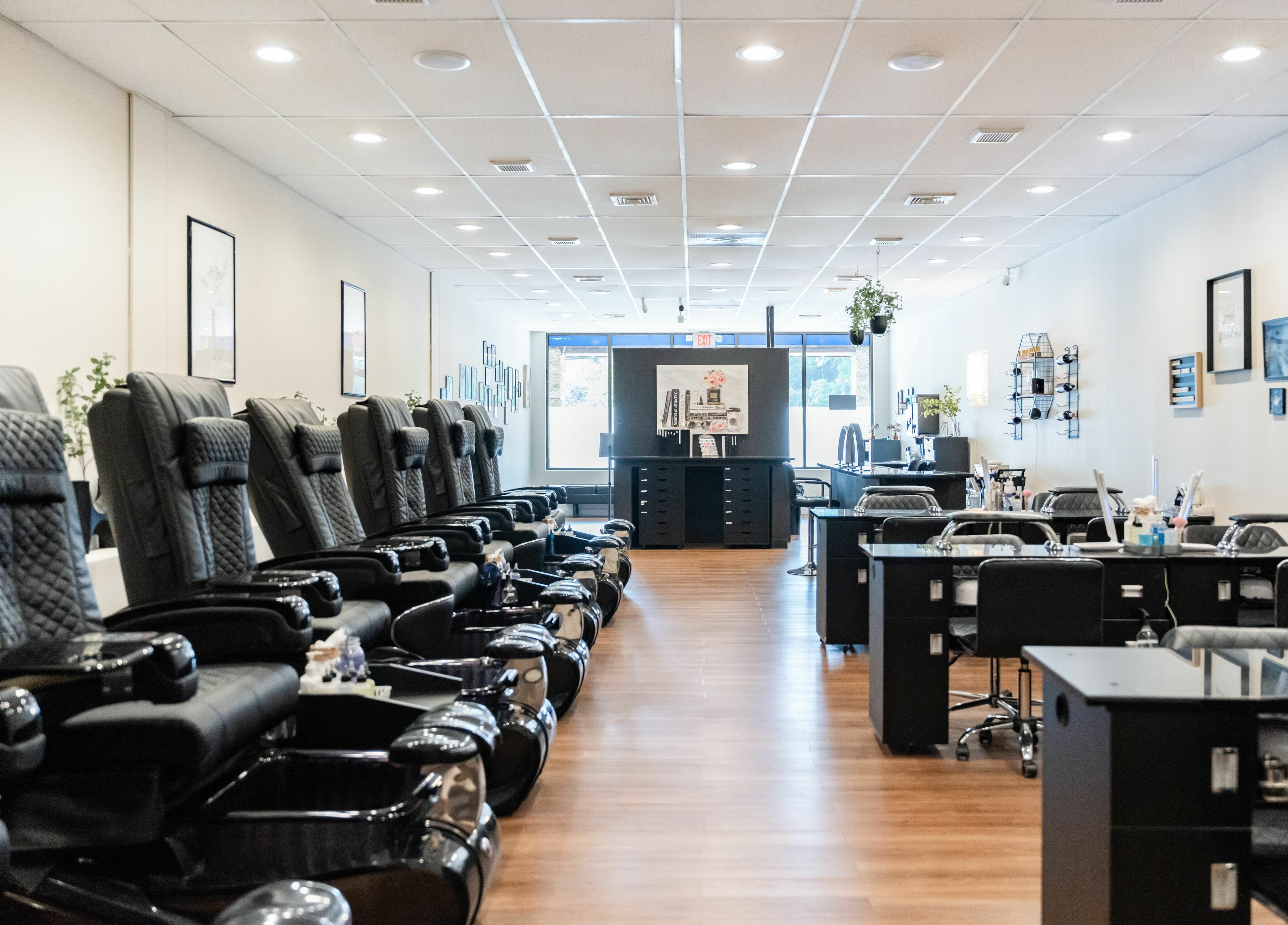 Spacious interior of Onyx Nail Bar in Voorhees Township, New Jersey, US with elegant pedicure chairs.